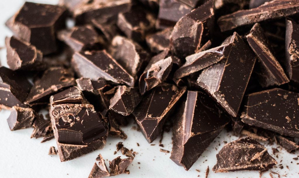 Pieces of dark chocolate bar.