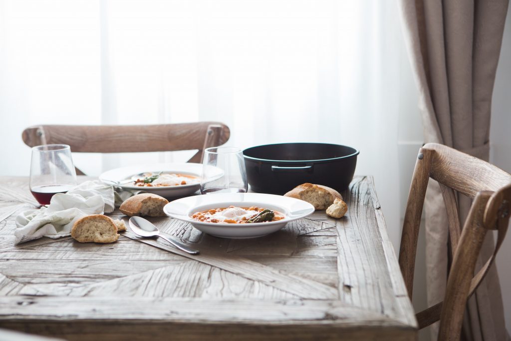 A table set for two with food served. Healthy eating tips to fuel your fitness.
