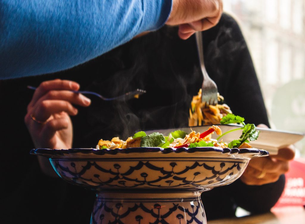 A close up image of a serving plate full of salad.