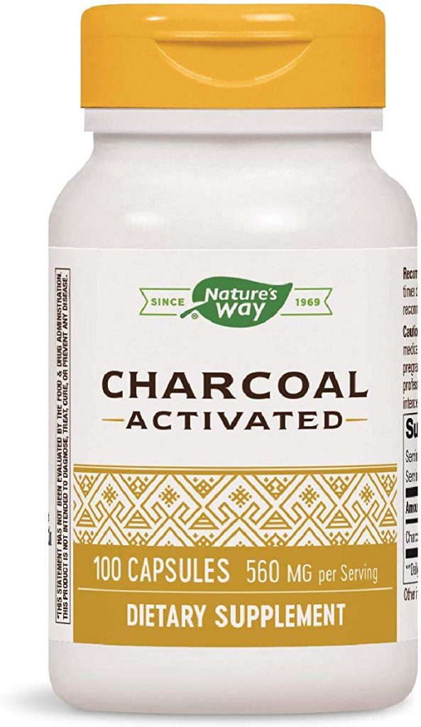 A bottle of activated charcoal, often advertised as a home remedy for bloating