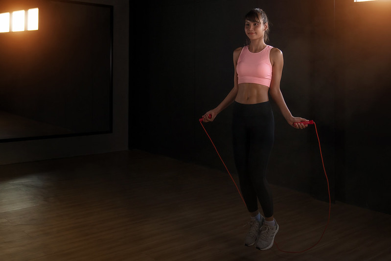 A woman using a jump rope