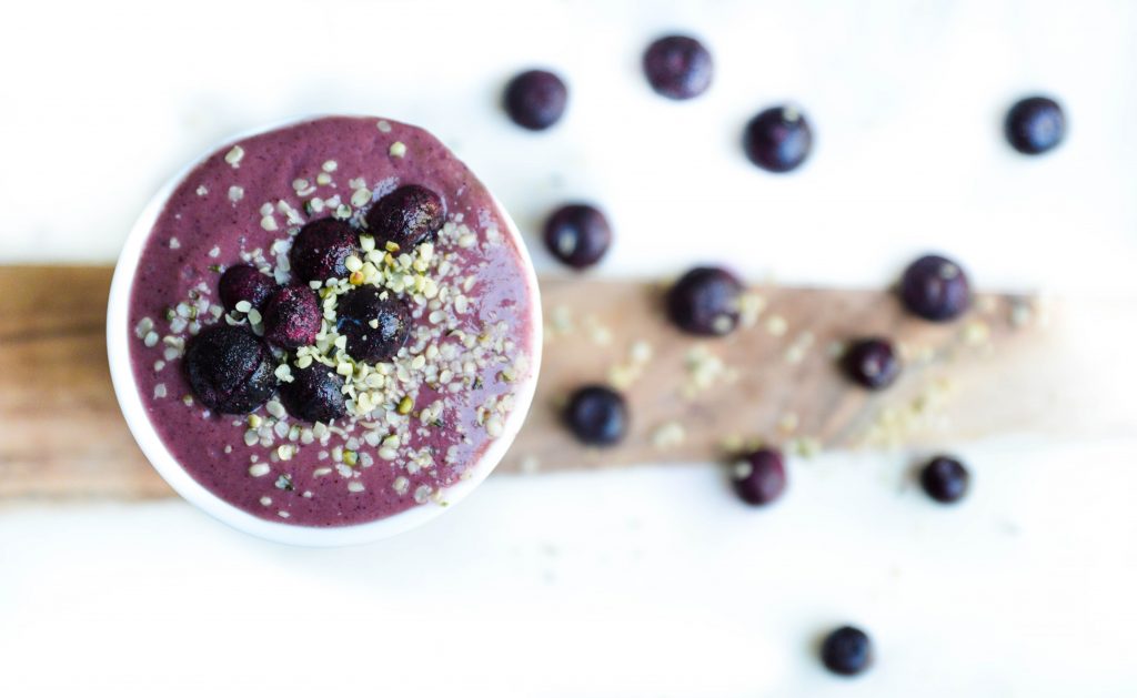 Close up top view of blueberry smoothie. Check out these healthy vegetarian recipes.