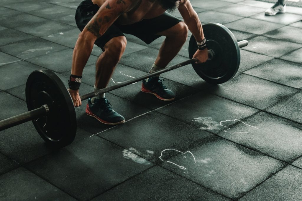 Man doing some weightlifting.