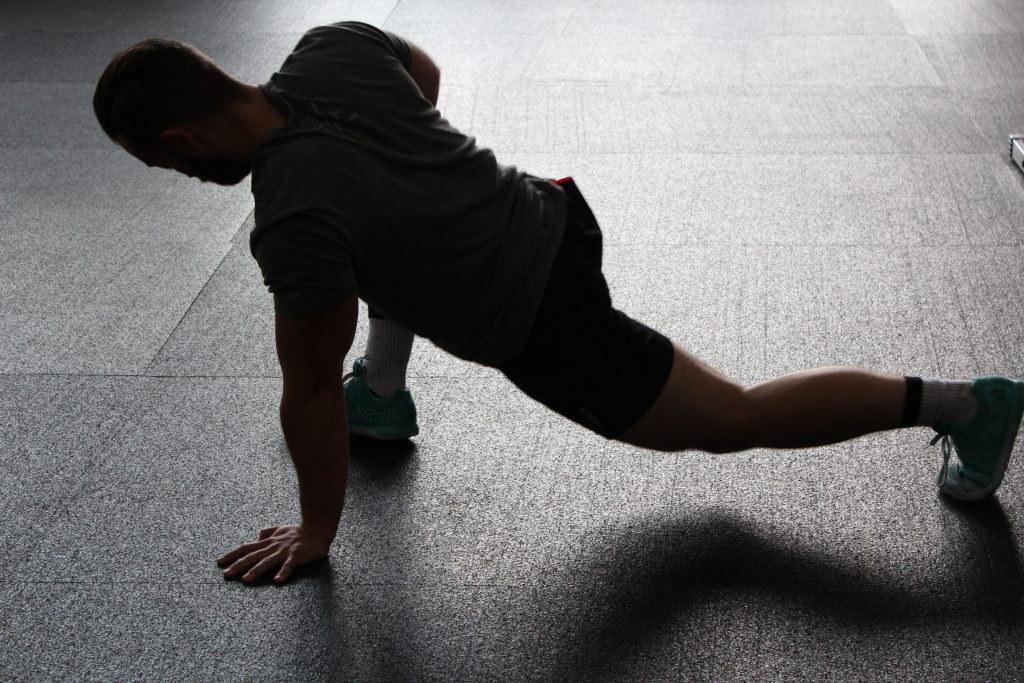 Man stretching legs.