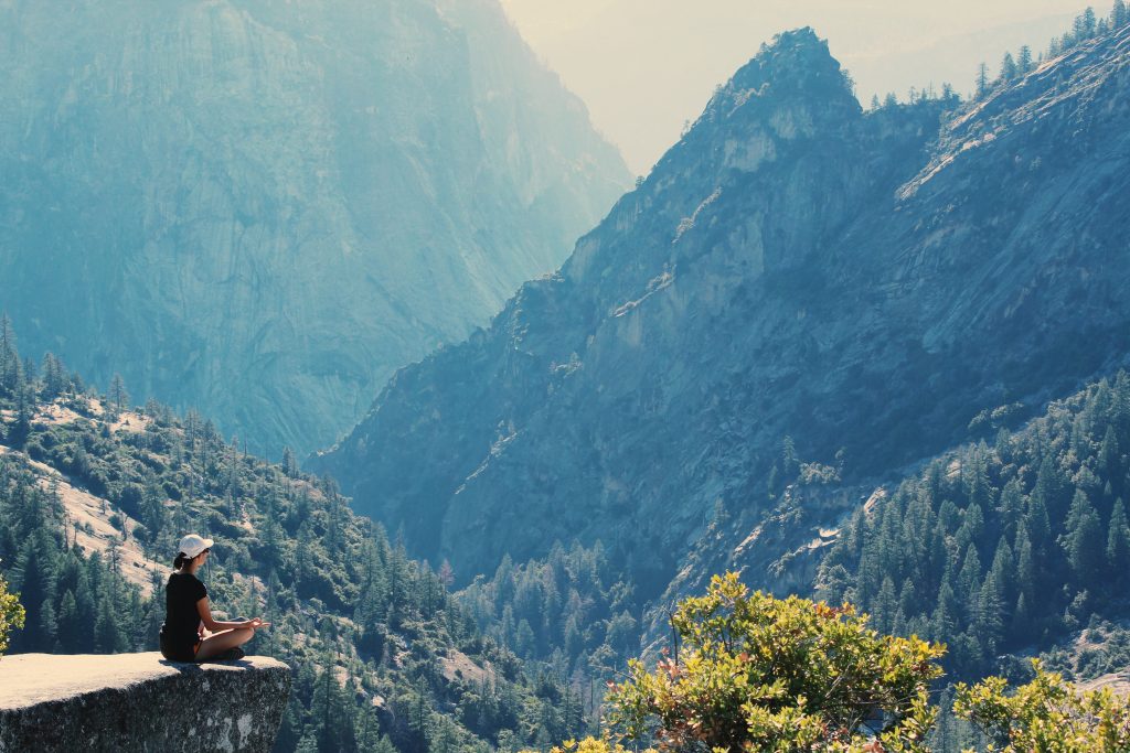 Woman meditating as a mindfulness-based stress reduction activity