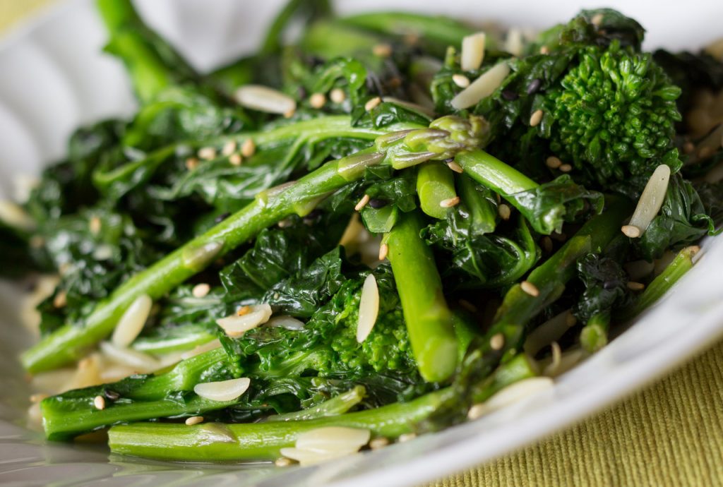 A platter of roasted broccoli and asparagus. Would you like recipes for winter vegetables like these?