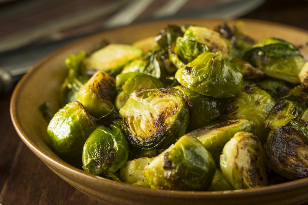 close up of a bowl of seared brussels sprouts as a keto vegetable