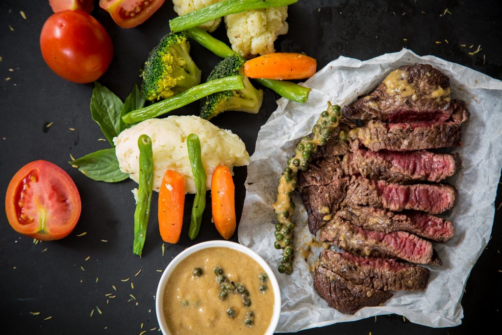 Steak and vegetables.
