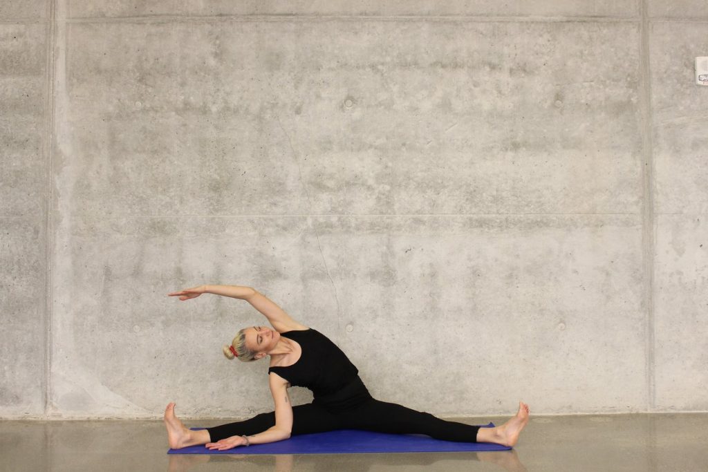 A woman doing some stretches.