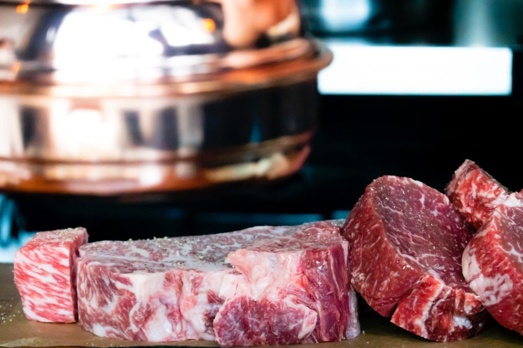 Sliced red meat.