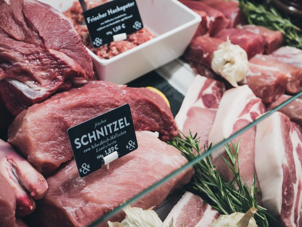 Close up of different kinds of raw red meat.