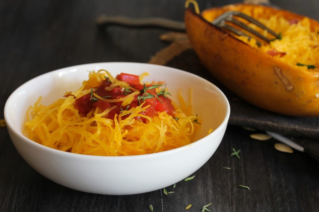 Spaghetti squash in a white bowl.