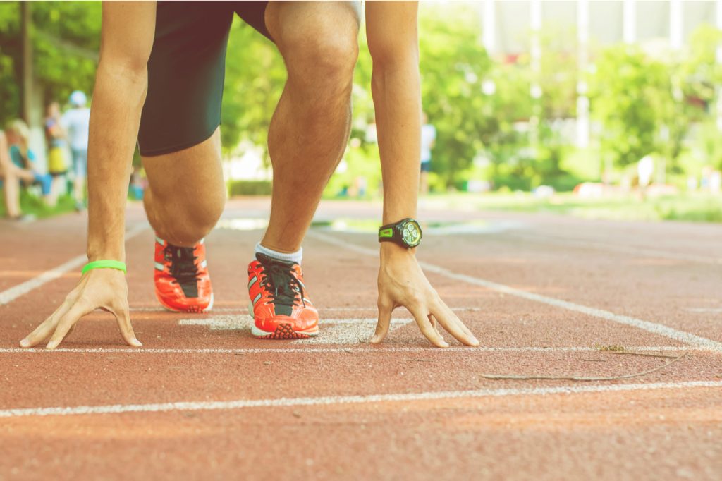 Athlete waiting at the starting line of a sprint race.