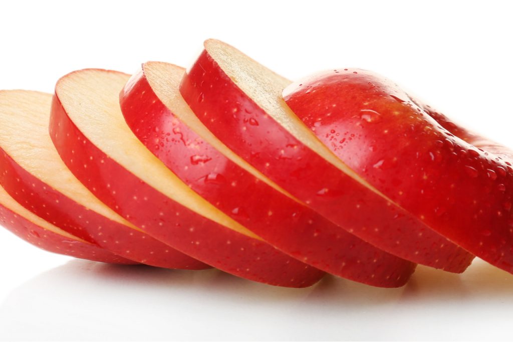 Closeup of apple slices, representing attractiveness.