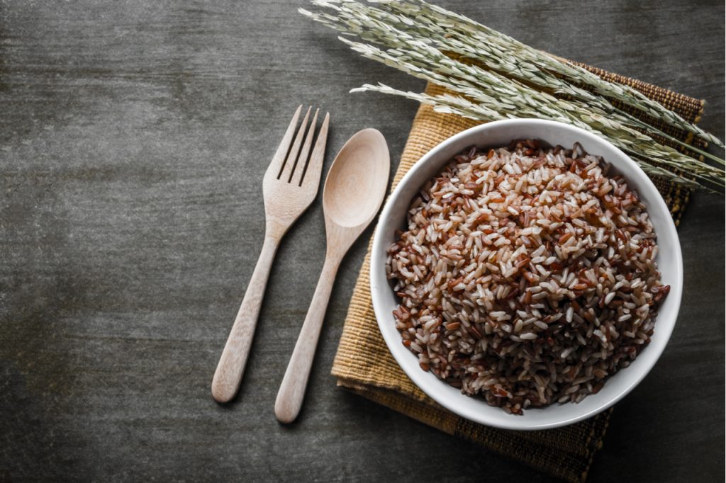 Brown rice in a bowl as source of energy so you can perform better.