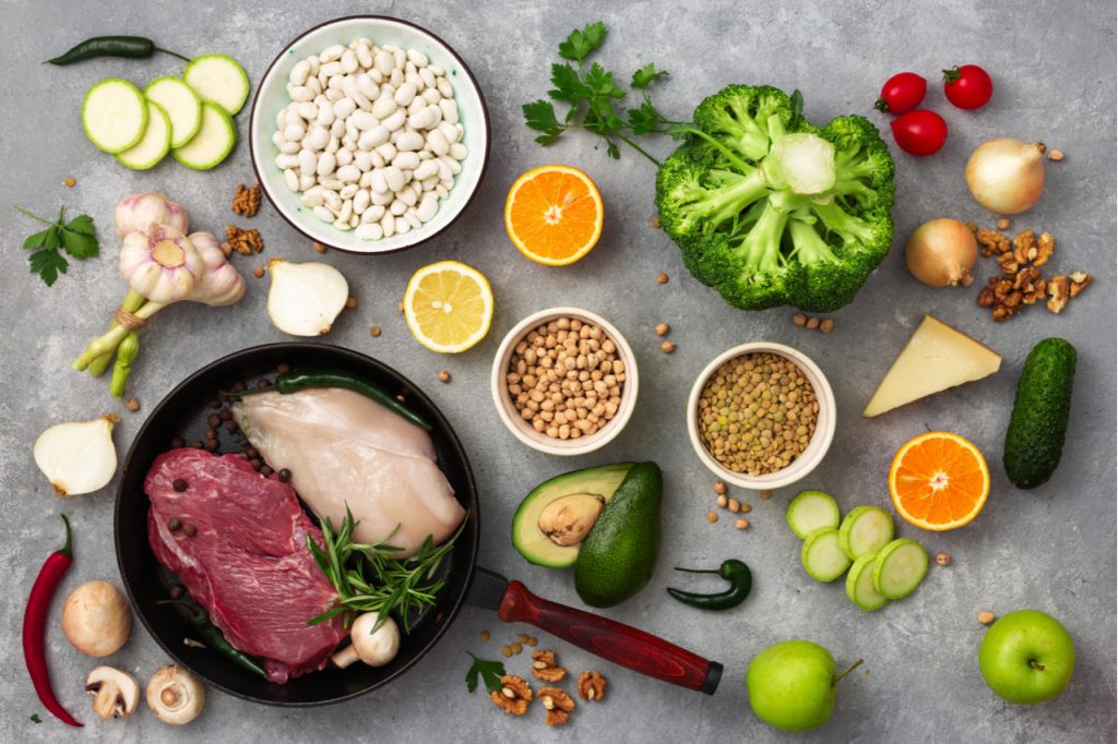 Selection of fruits, vegetables, meat and nuts.