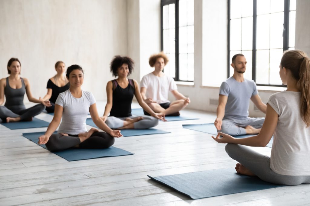 A group of individuals doing a course in mindfulness-based stress reduction (MBSR).