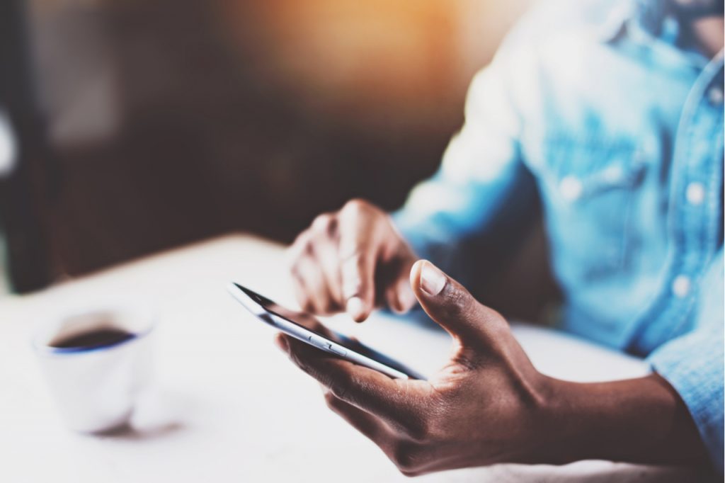 A man checking his mobile phone