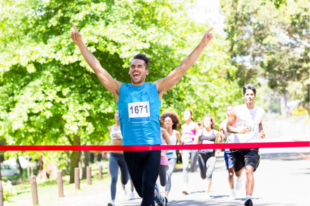 Man finishing the marathon.
