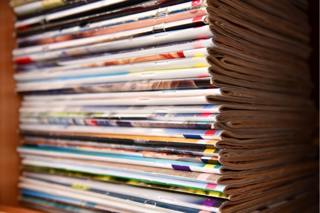 A stack of many magazines.