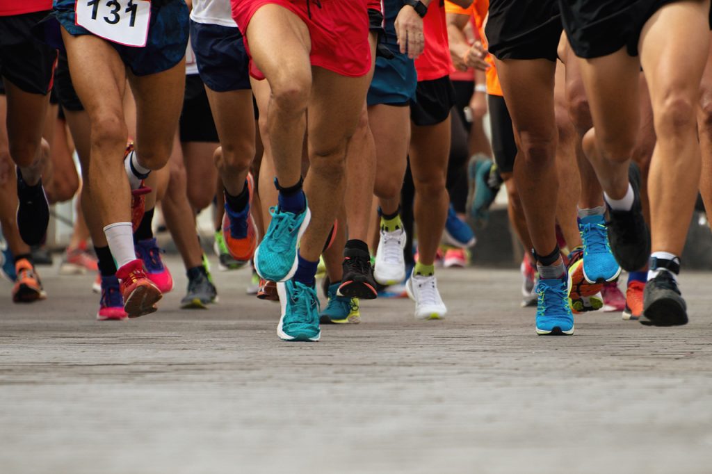 An image of a beginning or start of a race or marathon. Marathon for beginners needs to have a training plan.