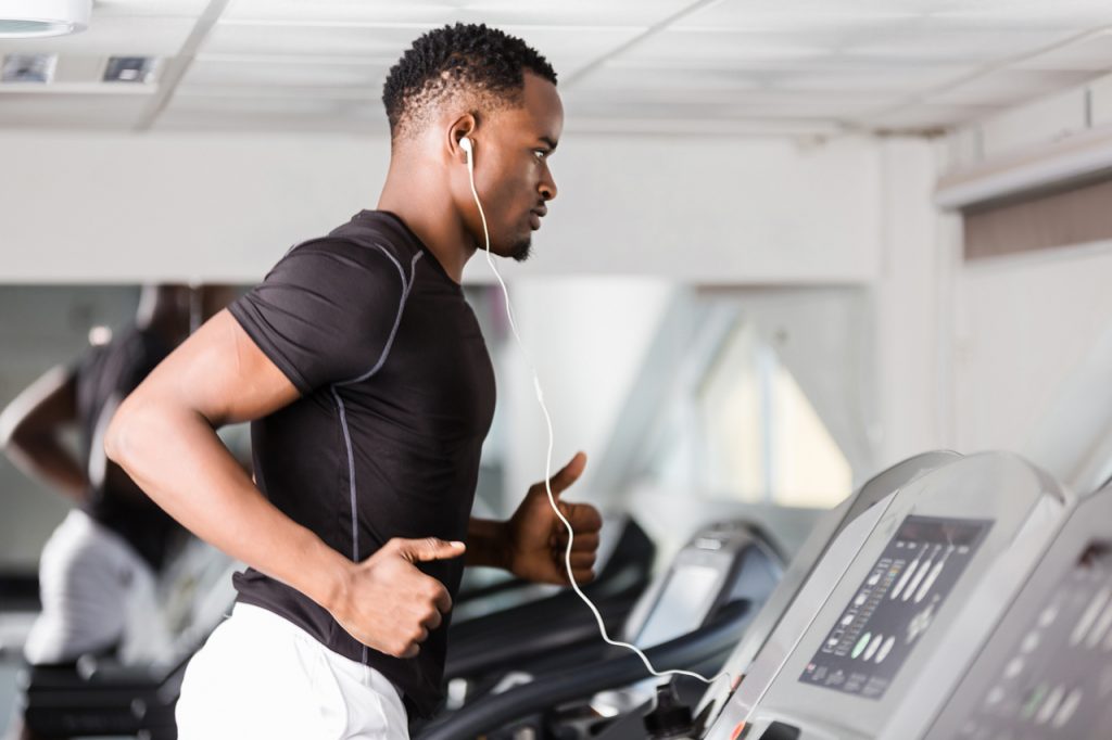 Man doing cardio workout at the gym.