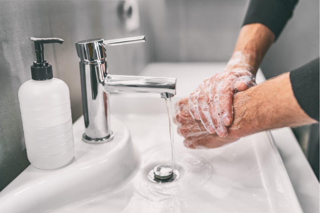 Washing hands rubbing with soap hygiene to stop spreading coronavirus.