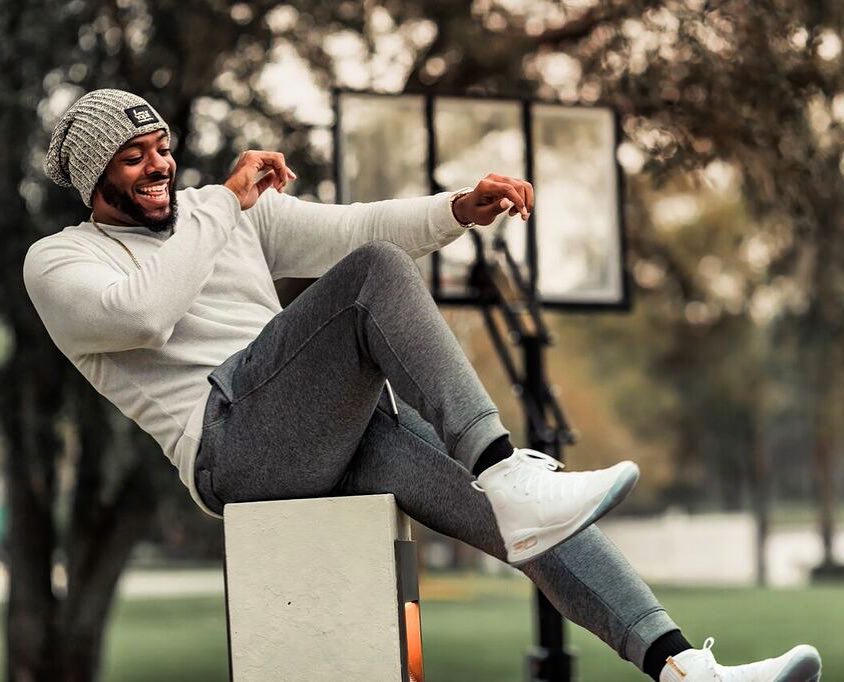 Eric Dunn looking so satisfied while admiring his new kicks from UA basketball.