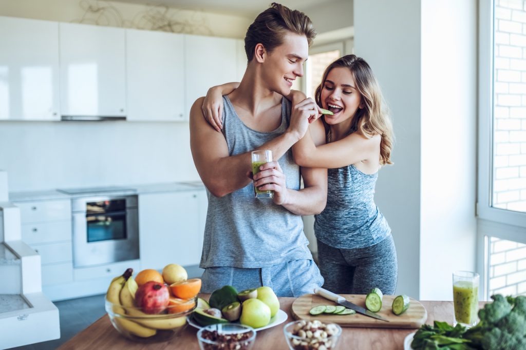 A healthy couple eating healthy foods. How to strengthen immune system?