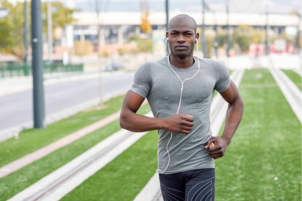Fit man jogging alone.