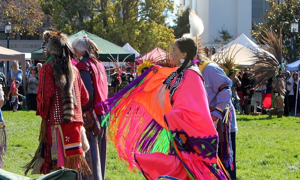 Several native americans celebrating Indigenous Peoples' Day.