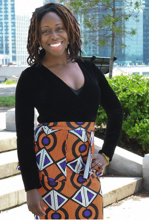 Dr. Stephanie Akoumany, close up shot wearing a black top.
