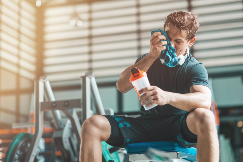 Man having a rest in gym.