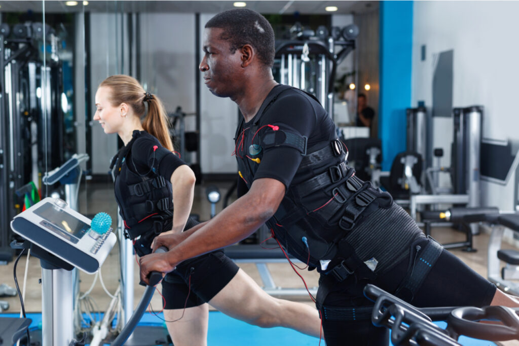 Man during EMS workout in fitness gym.