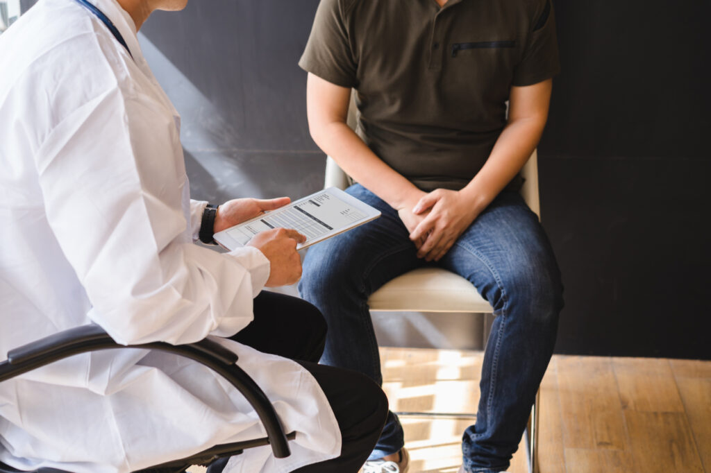 Male doctor and ED patient are discussing about ED. What is erectile dysfunction.