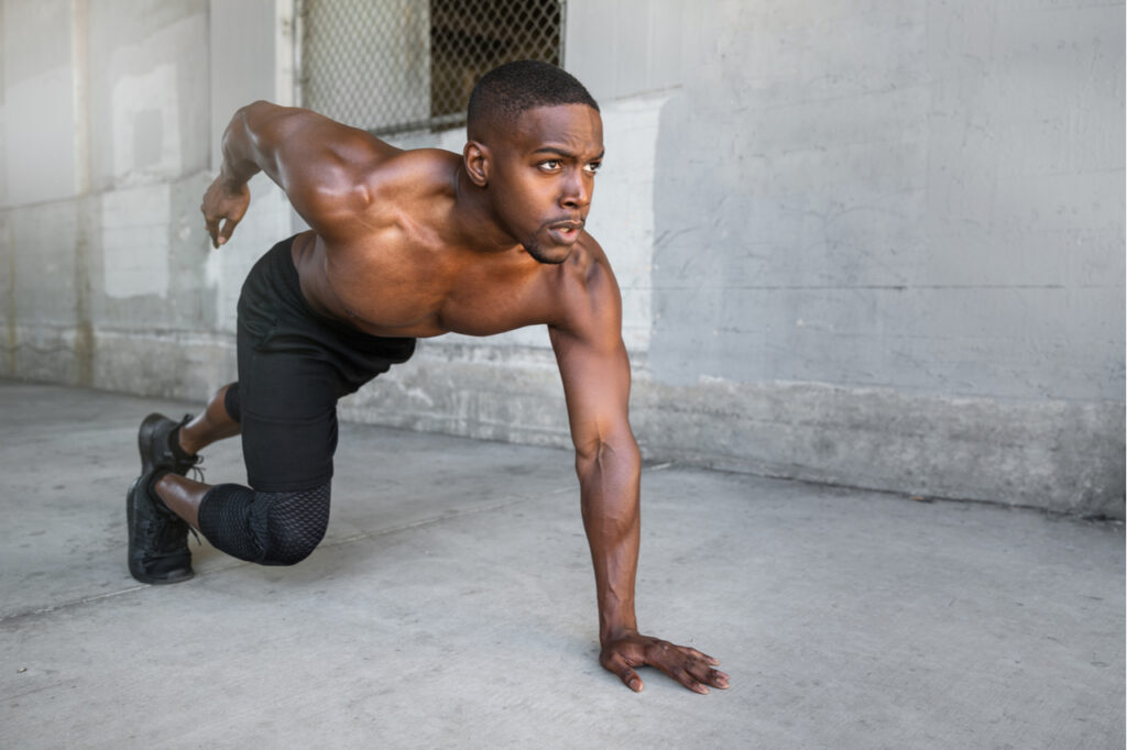 Athlete training in urban city concrete background after taking Pure Science L-Carnitine (L-Tartrate) 500mg capsule.