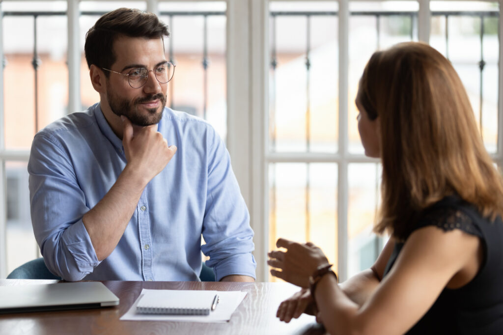 Man listening attentively to his colleague.