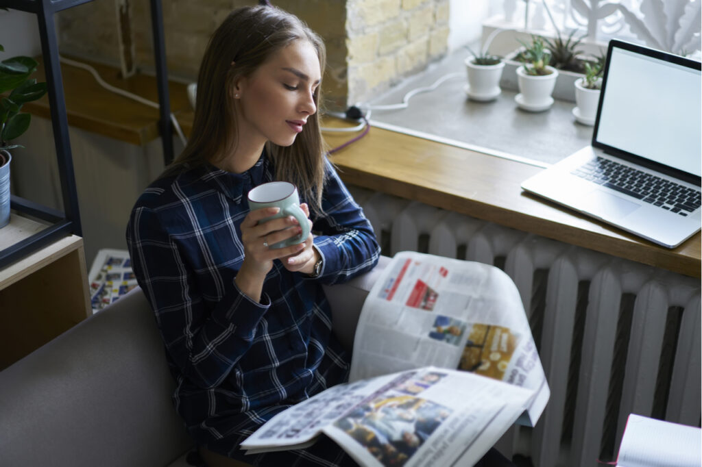 Woman taking a break at work while reading.