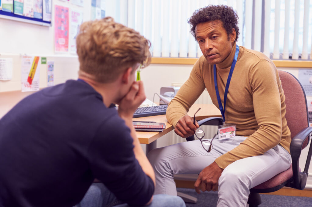 Man talking to a mental health counselor.