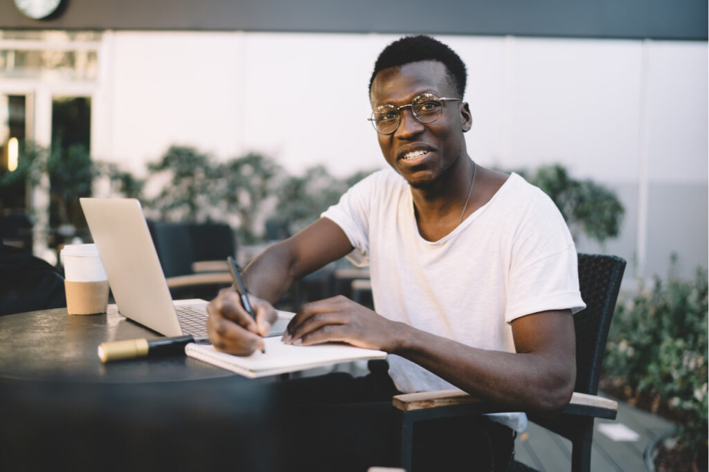 Man with obsessive-compulsive disorder journaling to cope with it.