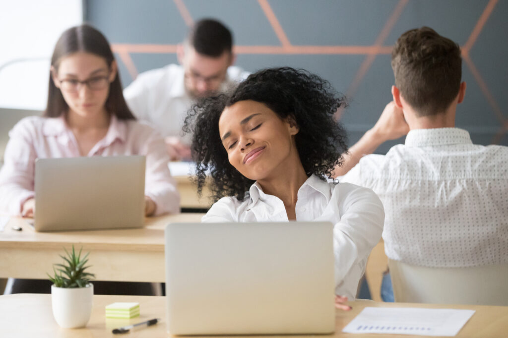 Woman feeling stress free while on break at the office.