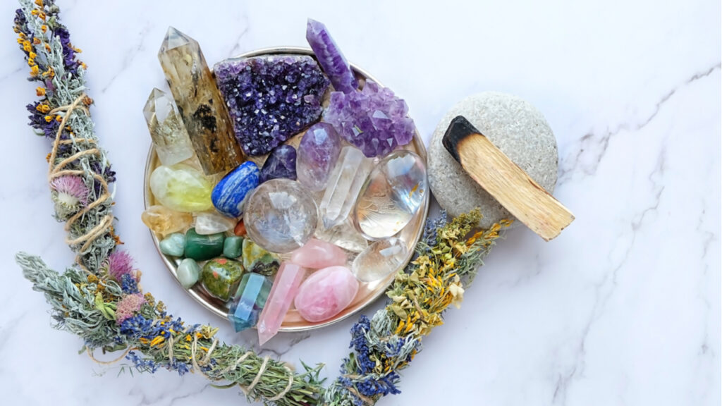 Chakra gemstones crystals, palo santo, floral cleansing bundles, nature magic things. Witchcraft Ritual, energy healing minerals. flat lay