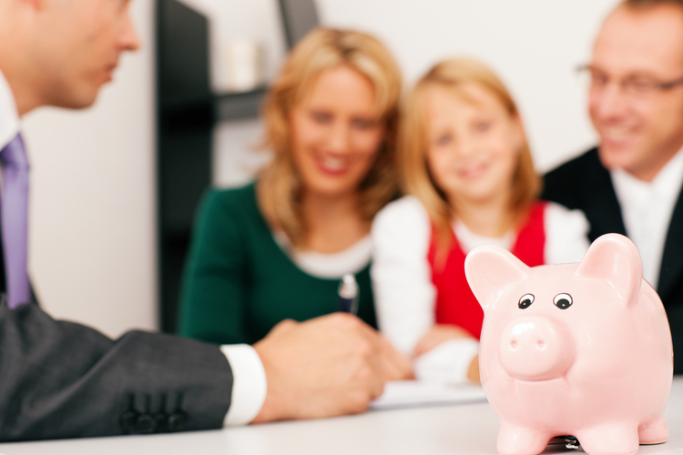 Family with their consultant doing some financial planning.