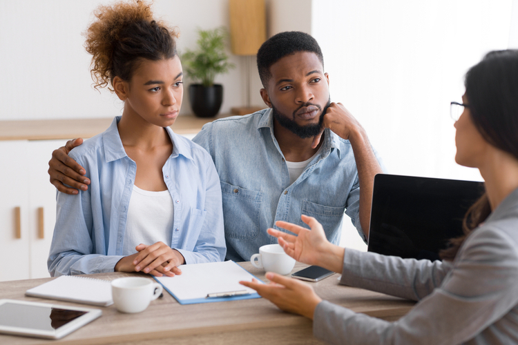 Couple having financial consultation.
