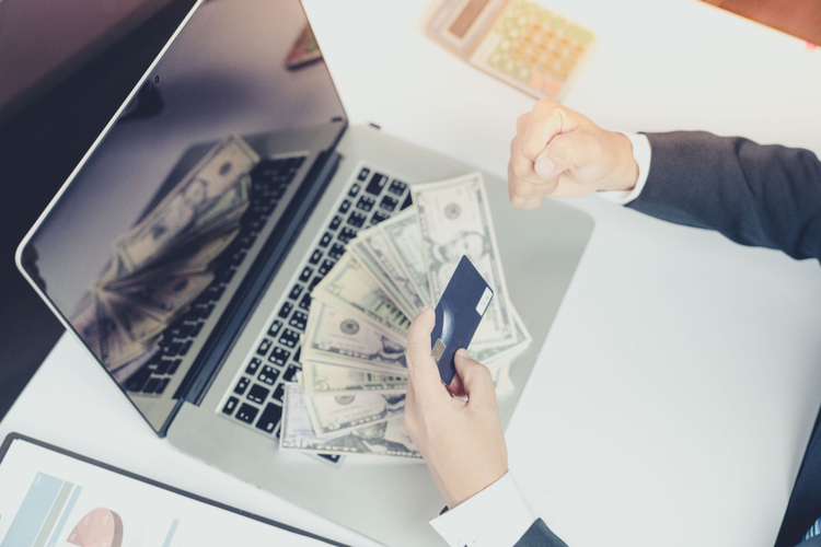 Make money from internet shopping online by computer laptop.