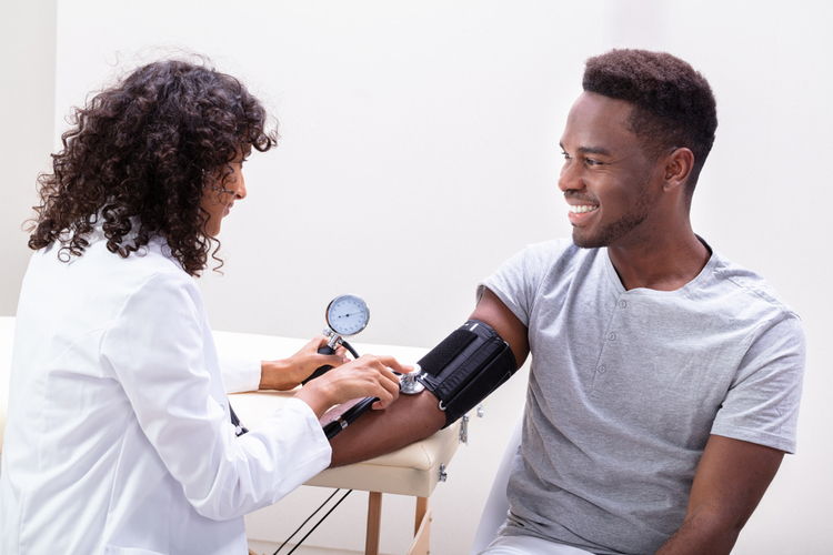 Man getting his yearly check up for men's health 5 easy wins to get in shape.