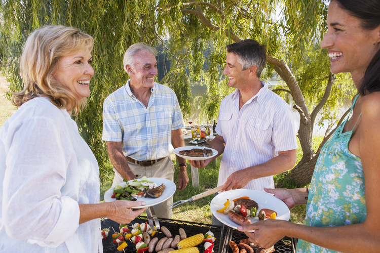 Family having barbeque together.