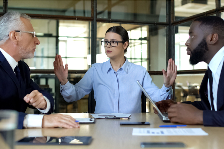 Woman in the office trying to do conflict resolution.