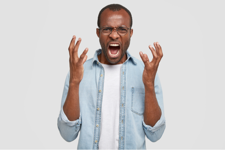 irritated Young African American Guy Gestures Angrily,