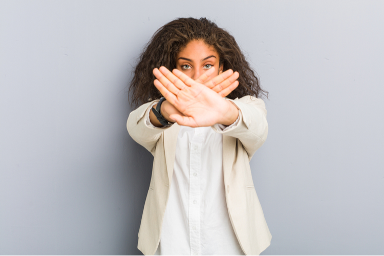 Young African American Business Woman Doing a Denial Gesture